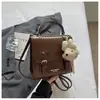 Bolsa Nova de Verão 2026 Feminina Fashion Personalidade Casual Estilo Coreano Mochila Pequena Mochila Doce para Senhora Nicho Versátil
