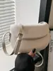 Bolsa Cruzada de Hombro de Moda Nueva Verano 2024 Casual Simple Bolsa de Concha de Presión Bolso de Silla Retro para Viajes