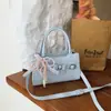 2026 Bolso Cuadrado Pequeño Nuevo con Lazo Bolso de Mujer Moderno de Gama Alta Versátil Bolso de Mano Hombro Cruzado Bolso Pequeño para Viajes Diarios