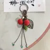 Pingente de Morango de Cerâmica Jingdezhen, Chaveiro Estilo Ins, Uso Duplo para Bolsas, Item Popular de Feira Noturna, Fornecimento Direto do Fabricante