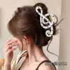 Nuevo clip de tiburón 2026 para otoño e invierno, pinza para el cabello de gran tamaño de alta gama para mujeres con cabello abundante, con diseño de lazo