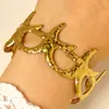 Pulseiras Largas Europeias e Americanas de Aço Inoxidável de Alta Resistência com Espiral Ondulado, Estrela do Mar, Esmalte Azul e Designs de Concha em Vários Estilos para uma Vibe Praiana