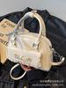Bolso Cuadrado Pequeño de Mano Simple Elegante 2025 Nuevo Estilo Coreano Moderno de Alta Gama Bolso de Hombro Moderno Combinable Bolso Bandolera