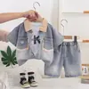 Conjunto de Verano para Niños 2026 Estilo Nuevo Ropa Casual Infantil para Niños Conjunto de Tres Piezas de Mezclilla Manga Corta Venta al por Mayor