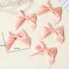 Acessórios de cabelo de laço de cetim 6,5*6,5cm transfronteiriços, materiais de artesanato DIY, acessórios de brinquedo, laços para atacado