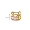 Versión Coreana de Anillo Sencillo de Acero Inoxidable con Forma de Corazón y Perla de Imitación Chapado en Oro de 18K Anillo Femenino Fabricante Venta al por Mayor