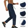 Calças de Corrida para Exportação Personalizadas, Calças Esportivas Respiráveis de Secagem Rápida, Ajuste Solto de Alta Elasticidade com Logotipo Impresso, Calças de Caminhada Masculinas para Exterior Personalização