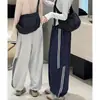 Nuevos pantalones casuales de otoño para mujer, diseño de cordón bordado, corte slim, holgados y versátiles, de cintura alta, con raya lateral, pierna ancha