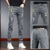 Novidade de Primavera Jeans Stretch Slim-Fit Masculino Perna Estreita Calças Casuais 2025 Tendência Primavera e Outono Calças Masculinas