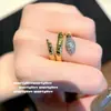 Anillo Envolvente de Serpiente Vintage Italiano con Gema Anillo de Zirconia Ginma con Cuentas Vintage conjunto