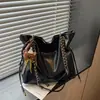 Bolso de moda estilo coreano para mujer, nuevo modelo 2026 para el uso diario, bolso cruzado simple de color sólido, bolso de cadena de gran capacidad, bolso de hombro