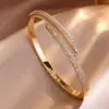RAKOL Moda Luxo Leve Cobre Incrustado Zircônia Trevo de Quatro Folhas Aberto Ajustável Pulseira Feminina Nicho Toque de Alto Padrão Joia de Mão
