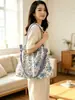 Bolsa de ombro com estampa floral para mulheres, bolsa tote de grande capacidade, bolsa de mão da moda estilo coreano, nova bolsa versátil de verão 2026, fábrica