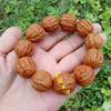 Suministro precio de fábrica Wen play pequeña Qiu Zi nuez de cáñamo pulsera de mano King Kong Bodhi pulsera de mano venta al por mayor