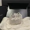 Bolsas Tejidas 2026 Nueva Primavera Estilo Coreano Diseño de Nicho Bolso Cubo Fresco y Sencillo Bolso Tejido de Encaje