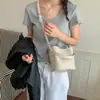 Bolso bandolera ligero y versátil, nuevo bolso cubo de tendencia 2026 con patrón tejido de nicho, bolso de mano portátil y versátil