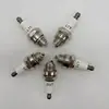 Vela de Ignição para Motosserra L7T Cortador de Grama Aparador de Sebes Pulverizador Gerador Vela de Ignição Peças para Máquinas de Jardim Atacado