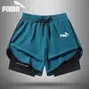Shorts Esportivos de Verão Pesados Estilo Europeu e Americano Cor Sólida Estampado Shorts para Corrida de Maratona Pista e Campo Secagem Rápida Estilo Americano Calça Esportiva Interna