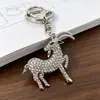 Estilo de moda transfronterizo llavero de cabra incrustado de diamantes, accesorio creativo y personalizado para llavero de bolsa y coche de la cabra del zodíaco