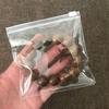 Bolsa de almacenamiento de joyería de PVC transparente con cremallera, conveniente a prueba de polvo, antioxidante, bolsa para cable de datos, bolsa de nuez para texto