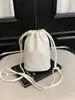 Bolsas Femininas Transfronteiriças 2026 Nova Versátil Casual Cordão Ombro Transversal Estilo Coreano Cordão Bolsa Balde para Celular
