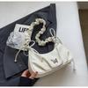 Bolso Cruzado Personalizado Nicho Verano 2025 Nuevo Moda de Alta Gama Versátil Plegado Cadena Bolso de Hombro Axila