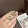 Brincos de Cristal Estilo Francês Retro de Luxo Leve Avançado Design de Nicho Feminino Fivela de Orelha de Qualidade Novos Brincos Quentes 2024