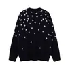 Suéter de punto jacquard cruzado oscuro estilo retro perezoso Americano Magic Bear, un suéter de punto de cuello redondo de moda estilo callejero