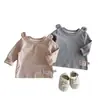 Novas Camisetas de Manga Longa para Meninos e Meninas da Primavera e Outono Cor Sólida Orelhas de Desenho Animado Pulôver para Bebês e Crianças Pequenas Roupa de Baixo Cor Sólida