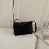 Bolsa de tela ligera versátil transfronteriza para mujer 2026 nueva popular de verano super caliente bolsa de nicho de un solo hombro cruzada