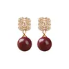 Aretes de Cinabrio para Mujer, Aretes Wangcai Xuanxue, Nuevo Estilo Caliente de Gama Alta, Nuevos Aretes Rojos Chinoserie, Accesorios de Otoño e Invierno