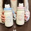 Taza aislada linda con temática de gato y compartimento para té, con cordón portátil, hecha de acero inoxidable 316, adecuada para estudiantes, y disponible para venta al por mayor y pedidos personalizados.