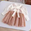 Vestido de Moda Infantil Primavera e Outono Novo Estilo Coreano Laço Malha Gola Redonda Manga Longa Menina Falso Duas Peças Saia