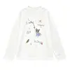 Camiseta base de algodón puro para niña 2026 nuevo modelo camiseta de dibujos animados de manga larga con cuello redondo para niños top de otoño