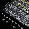 Joyería para Uñas de 12 Compartimentos Transfronteriza Nueva Joyería Navideña Aleación Copo de Nieve Alce Mixto Diamante para Uñas DIY