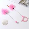 Nuevo gato mascota ticker Campana pluma juguete para gato alambre de acero gato ticker Interactivo auto Hola conjunto cuello gato ticker