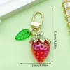 Acessórios Fofos de Concha de Fone de Ouvido Folha Verde Morango Pingente Joias de Resina DIY Chaveiro de Fruta Pingente de Bolsa Presente