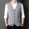 Chaleco de punto de lana con cuello en V para otoño e invierno para hombre, color liso con bolsillos, estilo casual de negocios, moda de papá moderna
