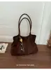 Bolso de gamuza para mujer 2026 nuevo de moda otoño vintage Maillard bolsa de mano para la ciudad gran capacidad bolso de hombro