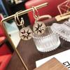 Pendientes elegantes y sencillos de estilo japonés y coreano con forma de estrella de ocho hombres, elegantes pendientes de nicho para mujer, pendientes de alfiler de plata s925 de celebridades de Internet.