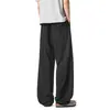 Textura refrescante pantalones rectos color albaricoque claro líneas segmentadas tridimensionales holgados adelgazantes ligeros con caída pantalones hasta el suelo moda masculina