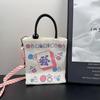 Bolso cuadrado pequeño para mujer, diseño de nicho, nuevo bolso de punto con dibujos animados para teléfono móvil, bolso bandolera de hombro para ir al trabajo.