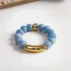 Pulseira Elástica de Contas Acrílicas Cruzada Europeia e Americana Estilo Férias Moda Pulseira Leve Luxo Toque de Alto Padrão Joia de Mão para Mulheres Venda por Atacado