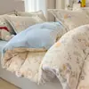 Juego de ropa de cama de cuatro piezas de terciopelo de leche, nuevo diseño de dibujos animados 2026, juego de sábana y funda de edredón de vellón de coral para invierno