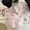 Ins Coreano Nuevo Estilo Aspecto de Alta Calidad Fresco y Dulce Estilo Harajuku Bolso de Hombro de Color Caramelo Ligero Salida de Primavera Bolsa Cruzada para Taza de Agua