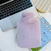Versión coreana de bolsa de agua caliente de peluche de conejo número grande bolsa de agua caliente de PVC inyección de agua compresa caliente fuente de calor para manos punto venta caliente transfronteriza
