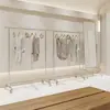 Arara de Exposição para Loja de Roupas Aço Inoxidável Chão ao Teto Criativa Roda Universal Arara de Exposição Nakajima Arara para Roupas Masculinas e Femininas Cabideiro