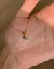 Nuevo Collar Redondo de Diamantes Flor de Iris para Mujer, Cadena para Clavícula, Elegante y Lujoso, Nicho, Gama Alta, Sencillo, Versátil, Diseño de Moda