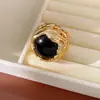 Anillo abierto de resina hueca con textura vintage, sensación exclusiva de nicho, joyería exagerada retro para mujer