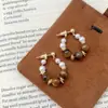 Aretes Redondos de Piedra Ojo de Tigre Perla Aretes Estilo Mid-Century de Lujo Ligero Moda Nicho Aretes de Gama Alta Venta al por Mayor Mujeres